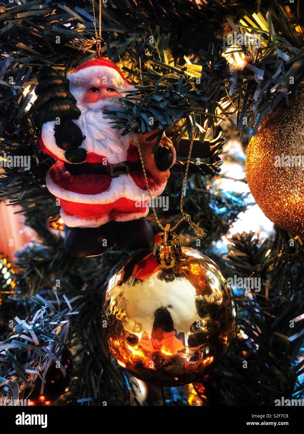 Christmas decorations hanging on a tree. Stock Photo