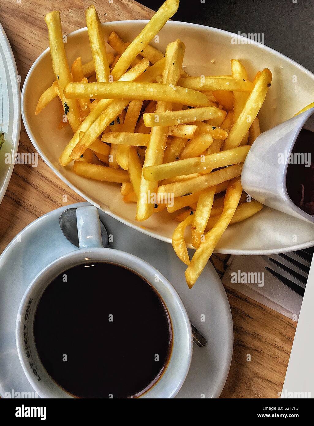 French Fries and Coffee Stock Photo