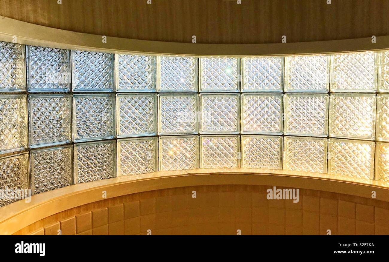 Textured glass panels backlit by sunlight - Smartphone Captured Stock Image