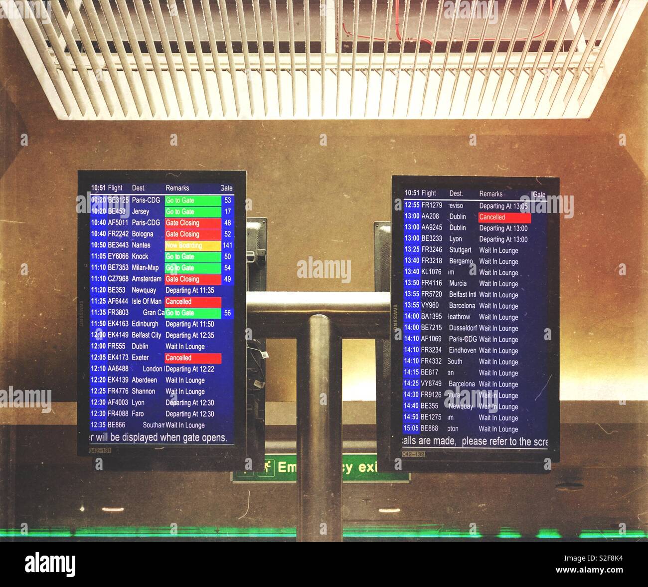 Airport flight departures information notice board showing destinations and  flight times - Manchester Airport, UK Stock Photo - Alamy