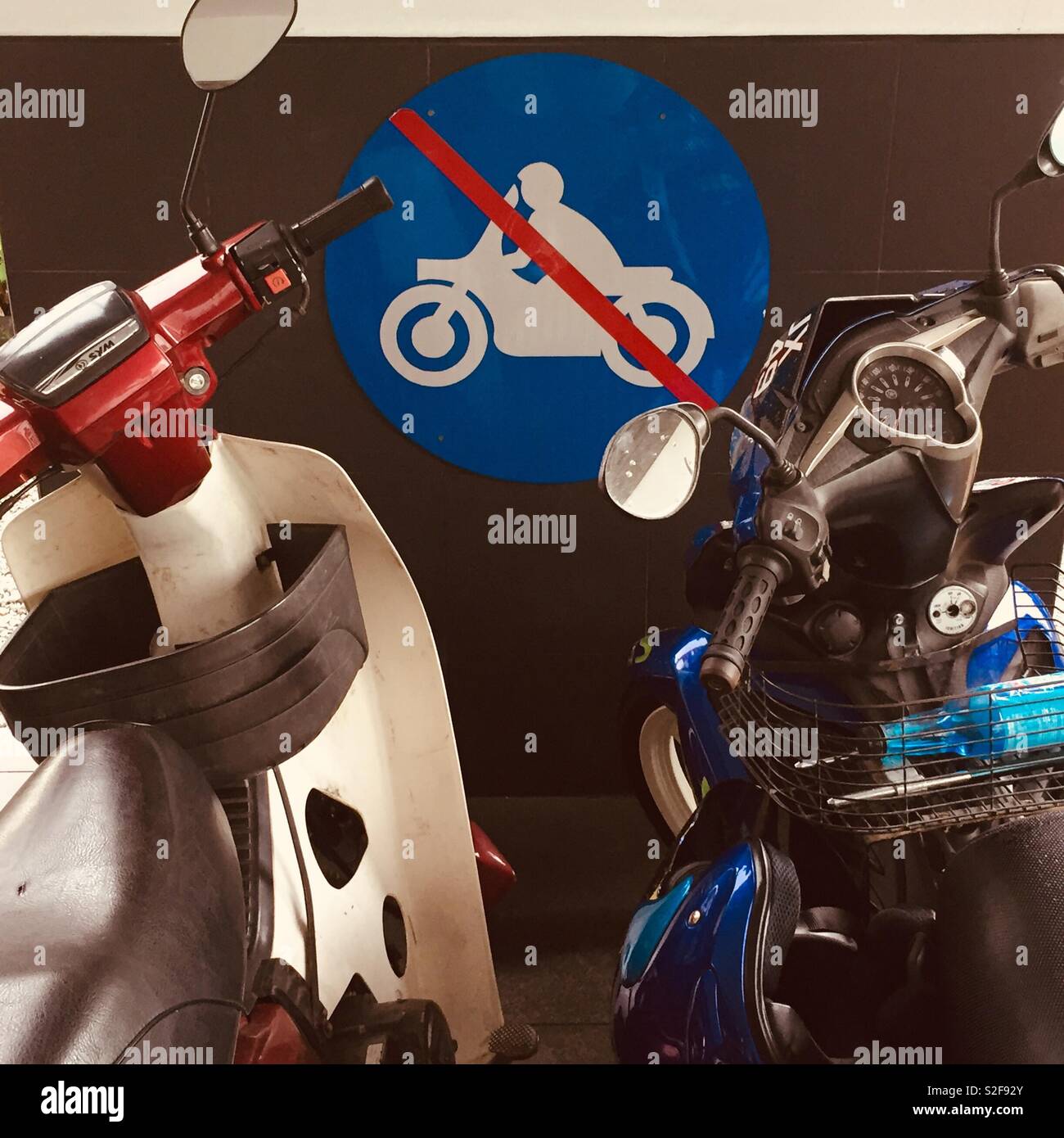 Mopeds parked in front on no parking sign in Georgetown, Penang, Malaysia - Smartphone Captured Stock Image