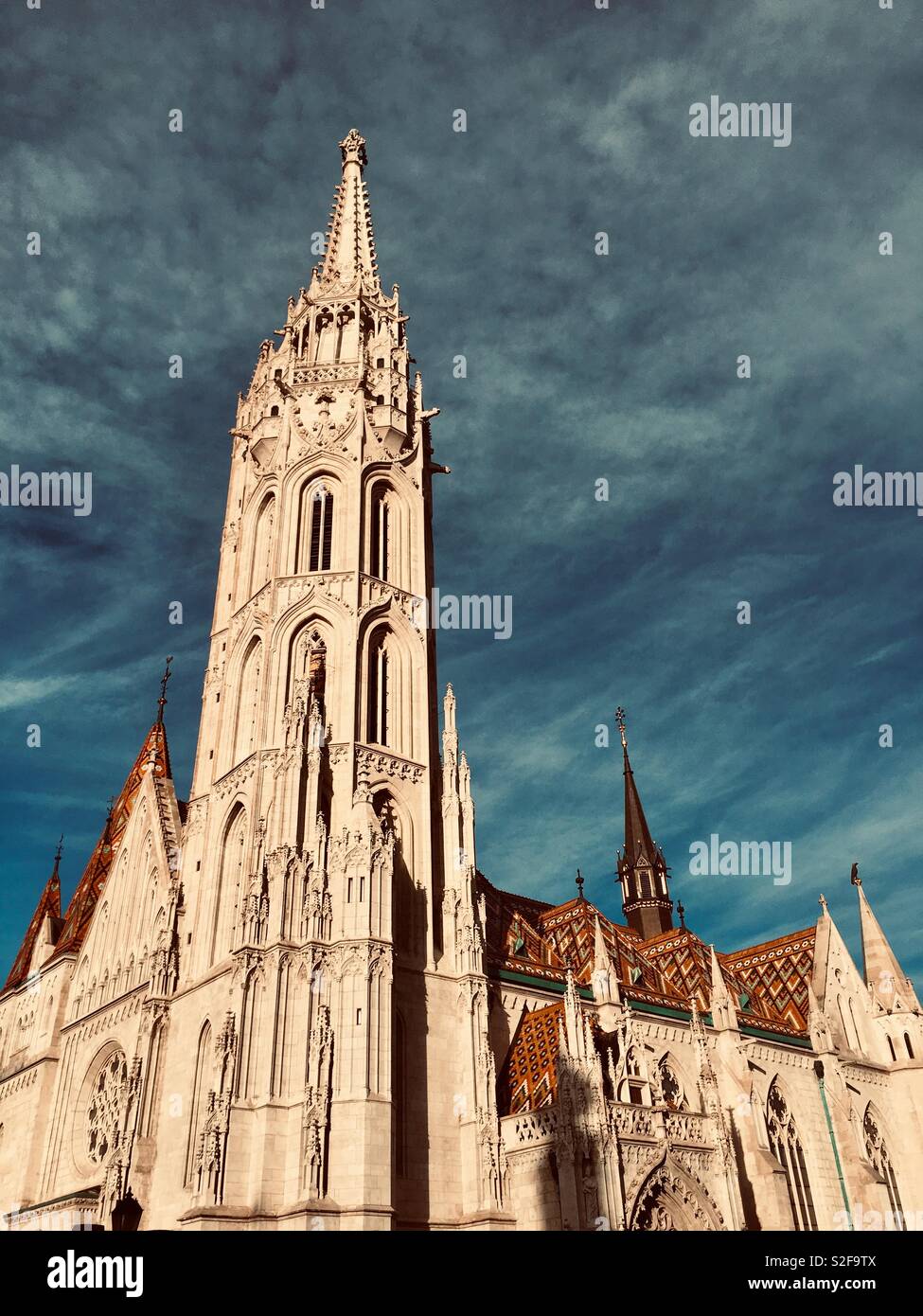Church in Budapest with coloured roof tiles - Smartphone Captured Stock Image