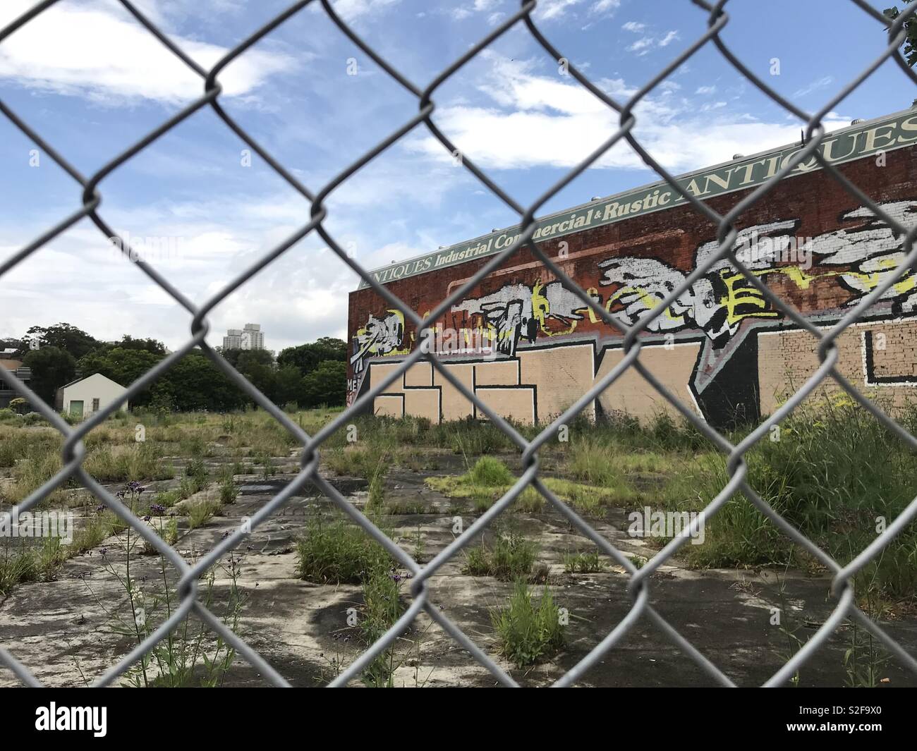 Former industrial area now a wasteland on Bourke Street, Waterloo in Sydney Australia. - Smartphone Captured Stock Image