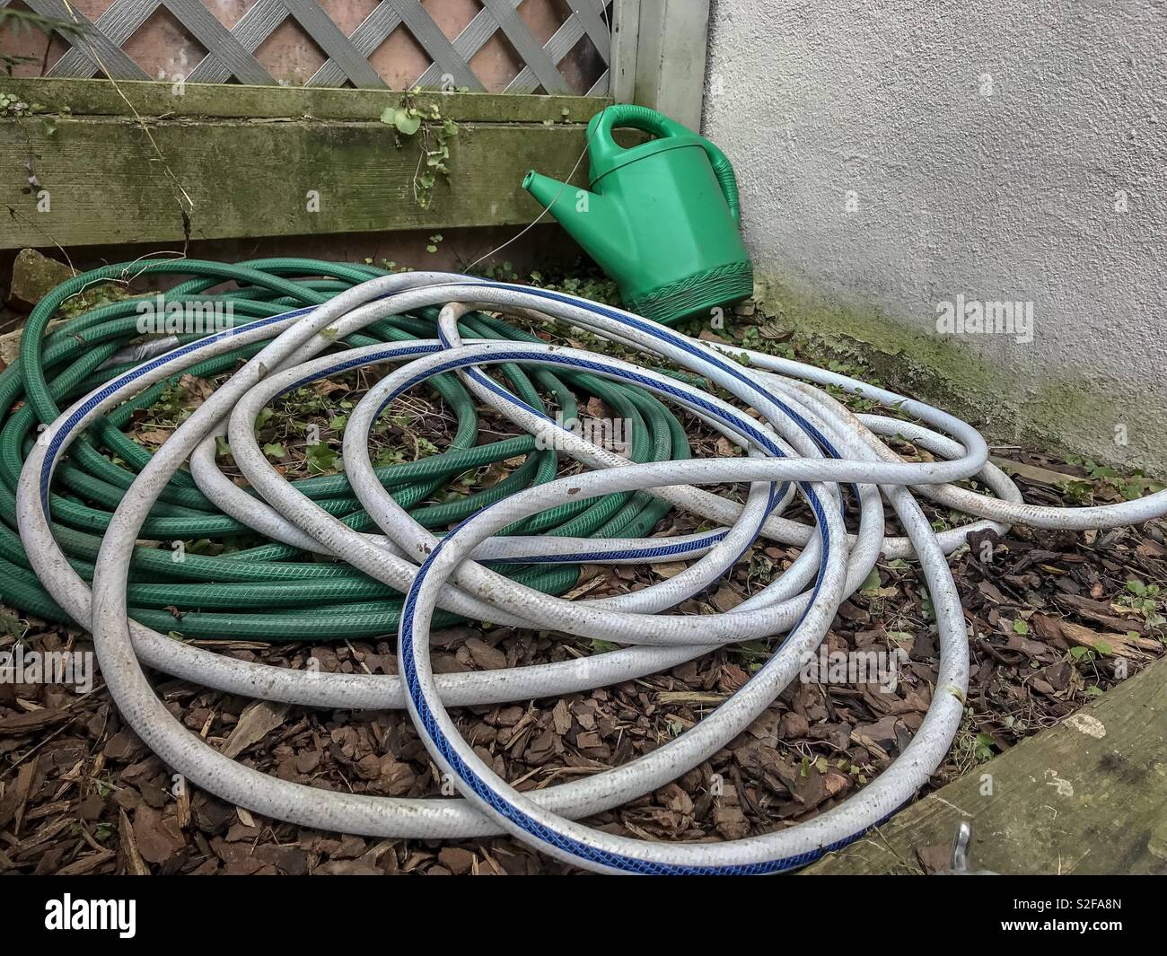Garden hoses hires stock photography and images Alamy