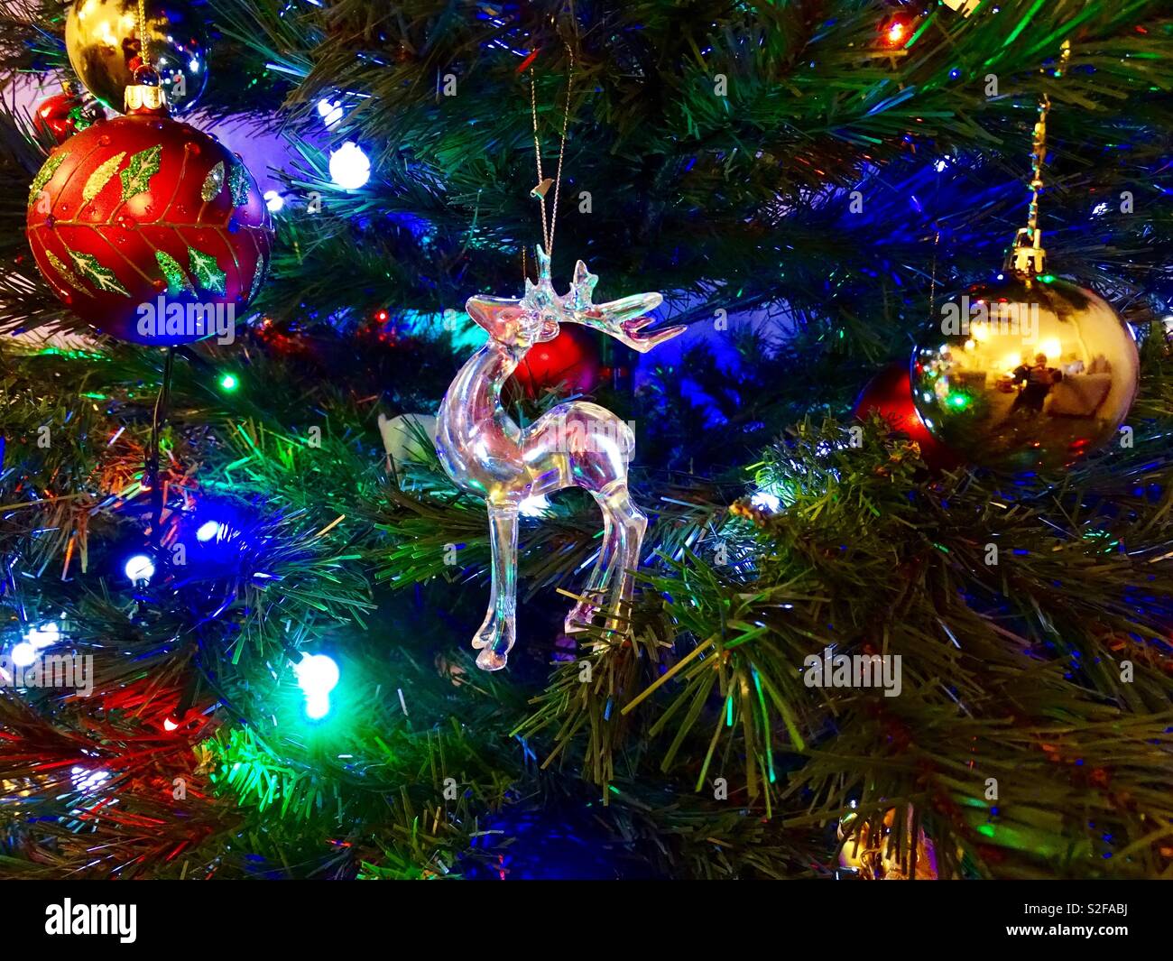 Reindeer Christmas ornament on Christmas tree Stock Photo