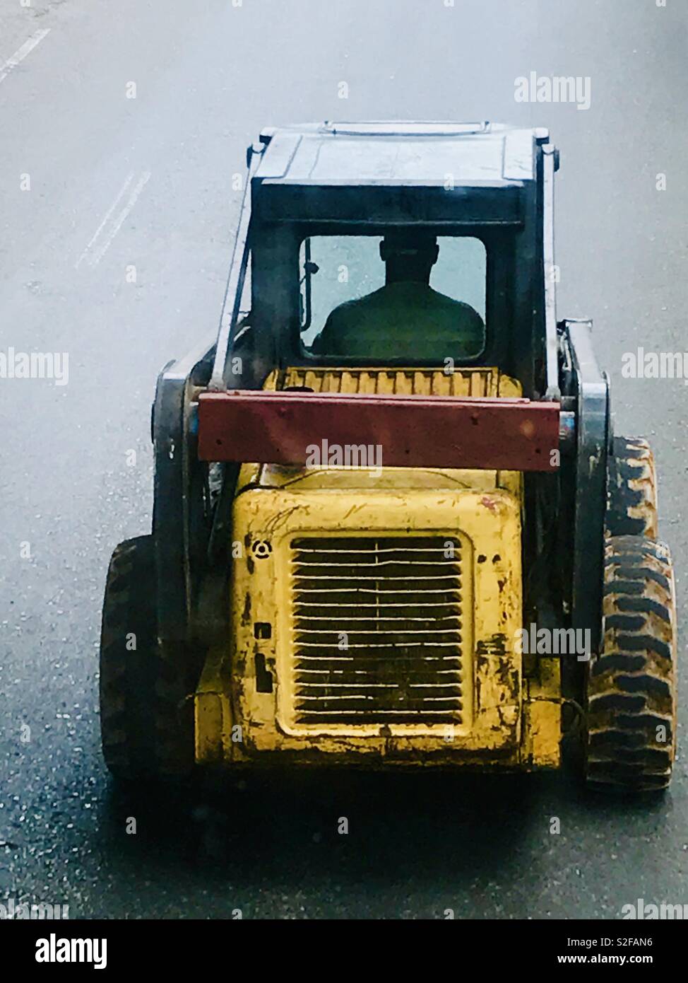 Tractor driving down the street in Havana Cuba Stock Photo