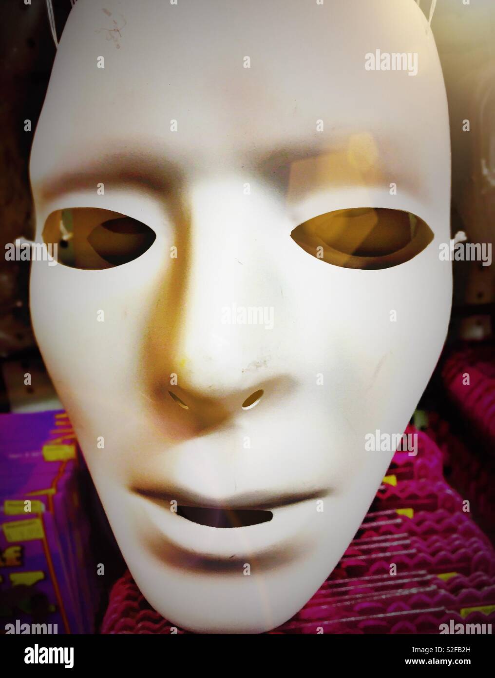 Spooky faceless Halloween mask for sale in a retail novelty store Stock Photo