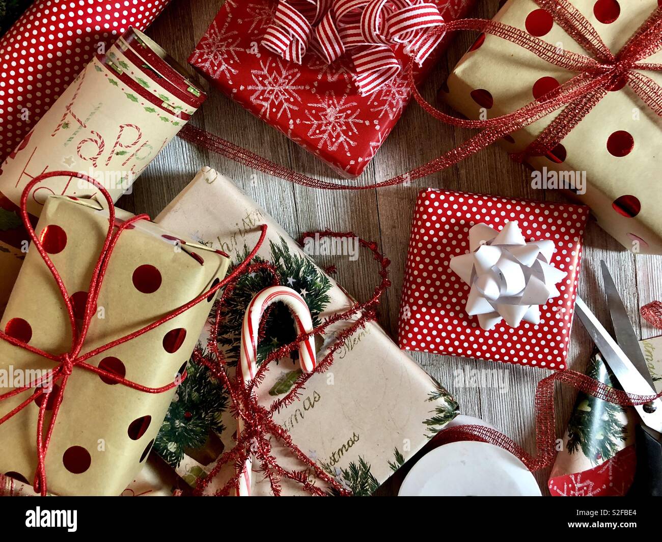 Top view of Christmas gifts and wrapping - Smartphone Captured Stock Image