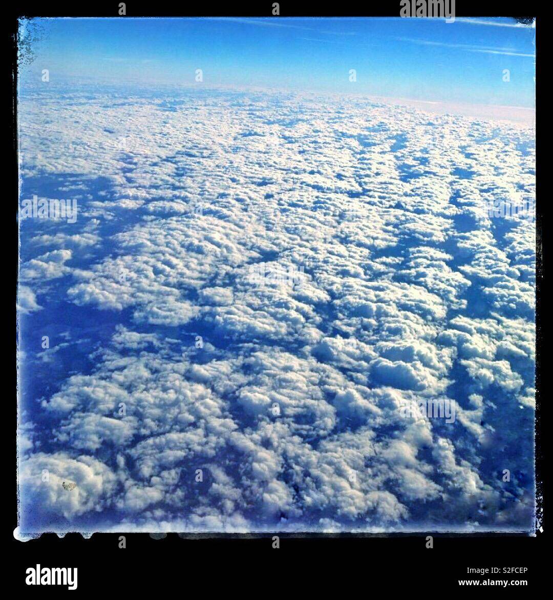 Flying above the clouds Stock Photo - Alamy