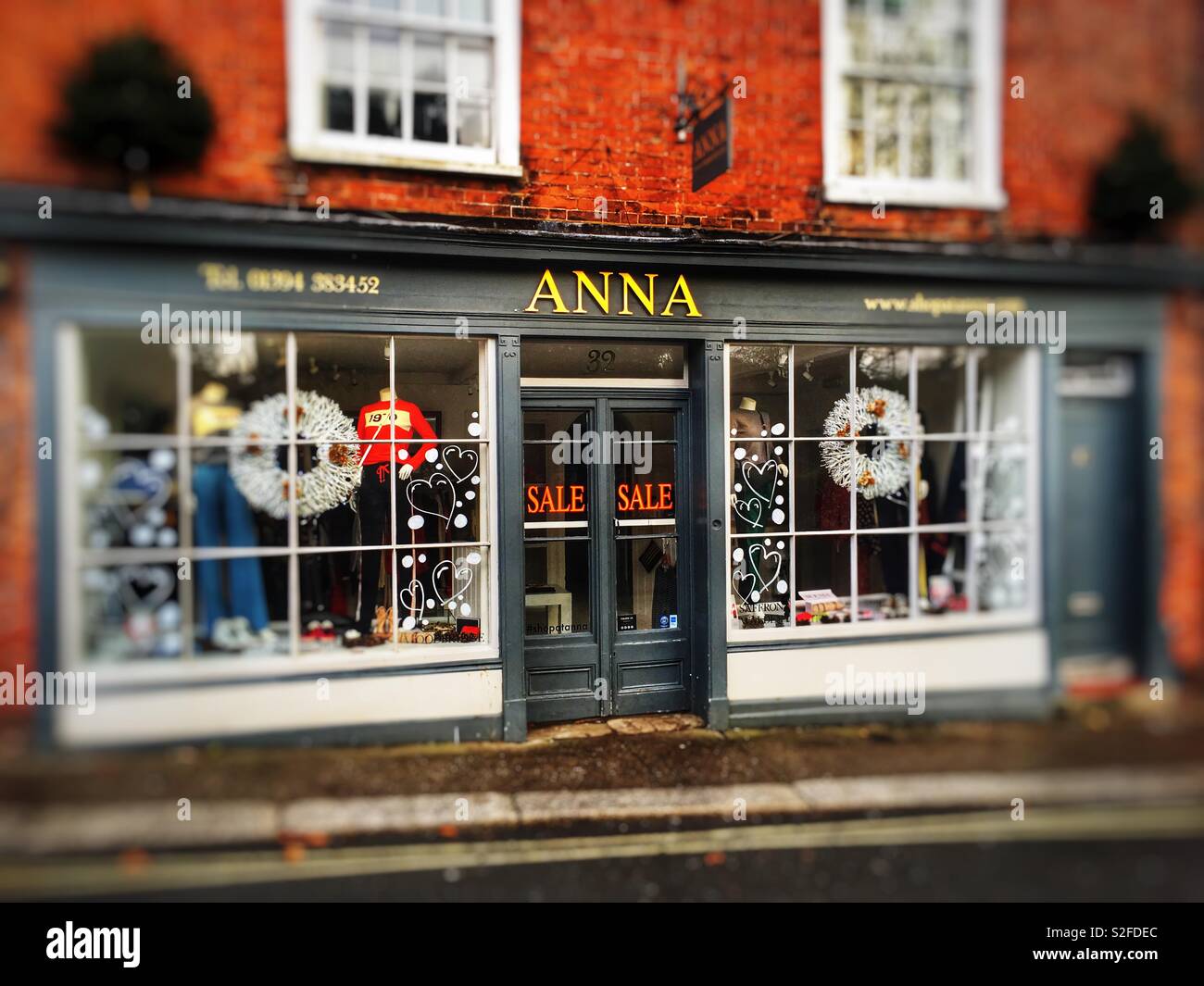 Anna, woman’s clothing shop pre-Christmas sale, Woodbridge, Suffolk, UK. Stock Photo