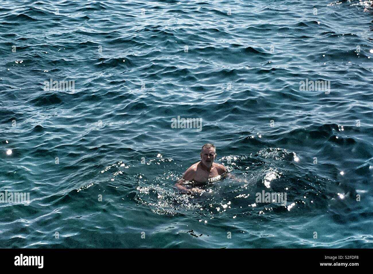Man In Water - Smartphone Captured Stock Image