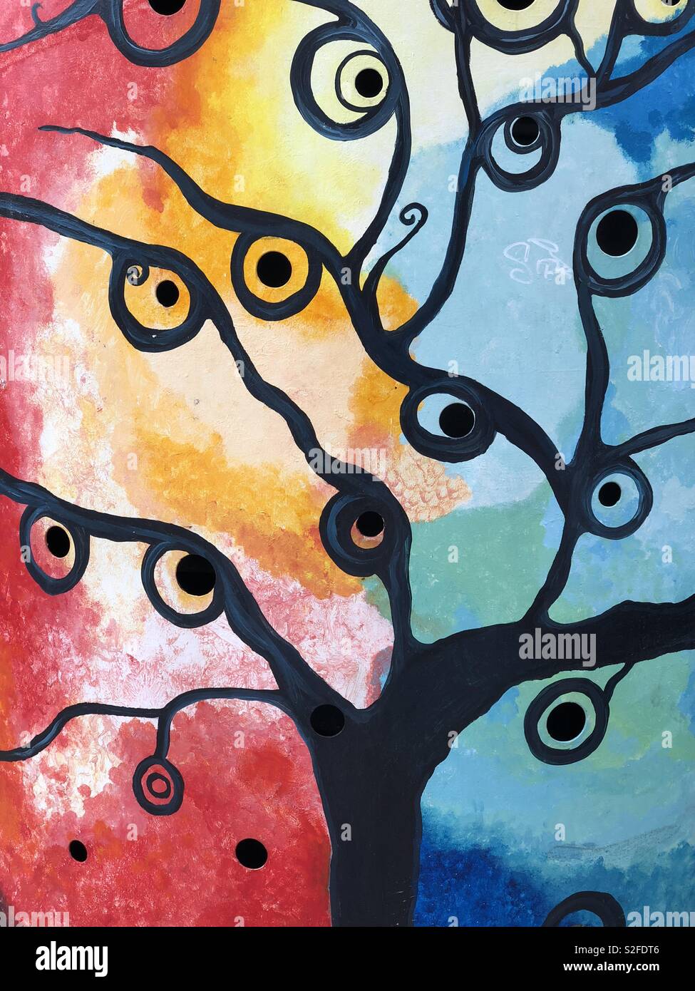 Abstract tree, creative graffiti over a metallic counter of the gas meter - Smartphone Captured Stock Image