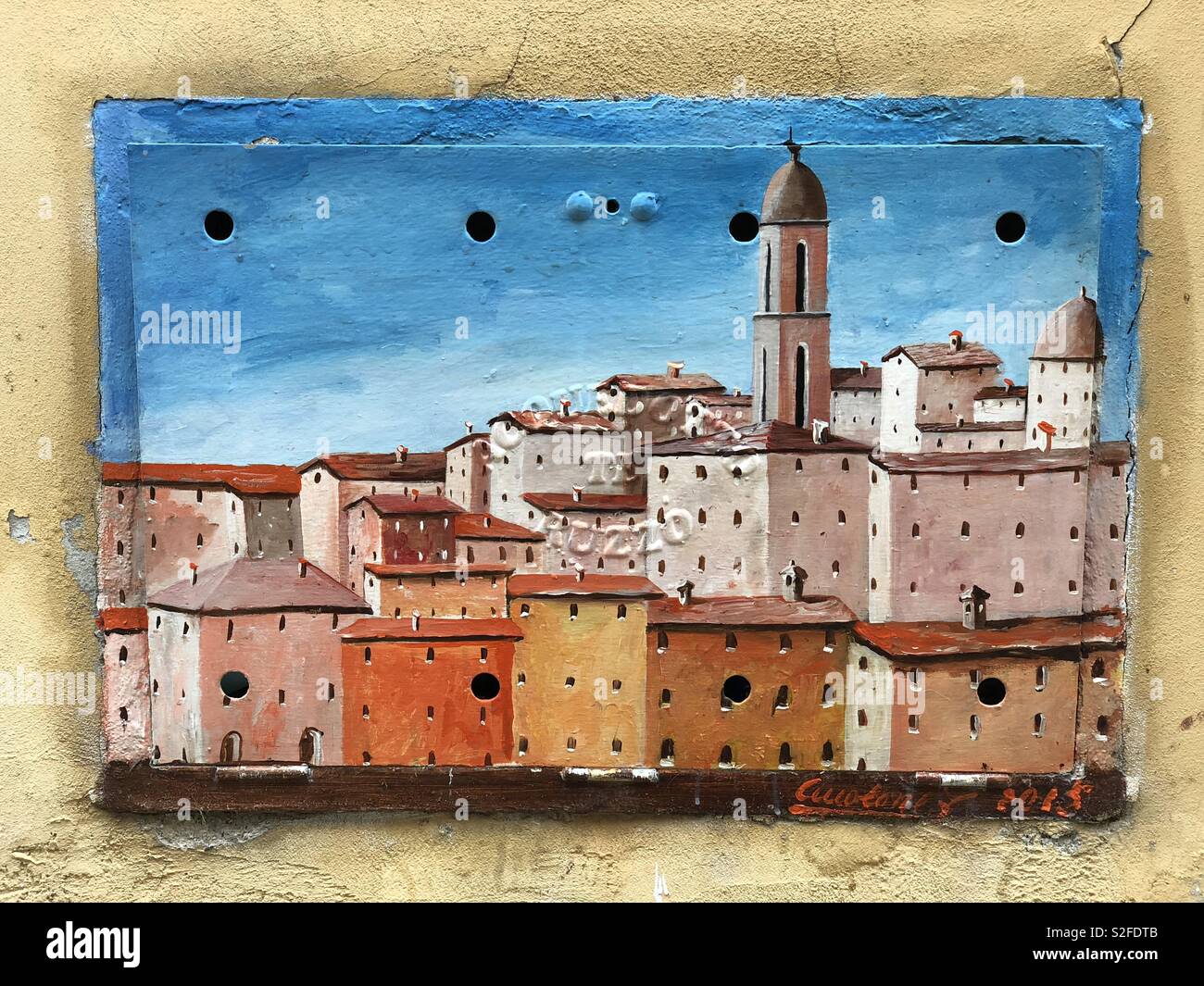 City of Giulianova view, creative graffiti over a metallic counter of the gas meter - Smartphone Captured Stock Image