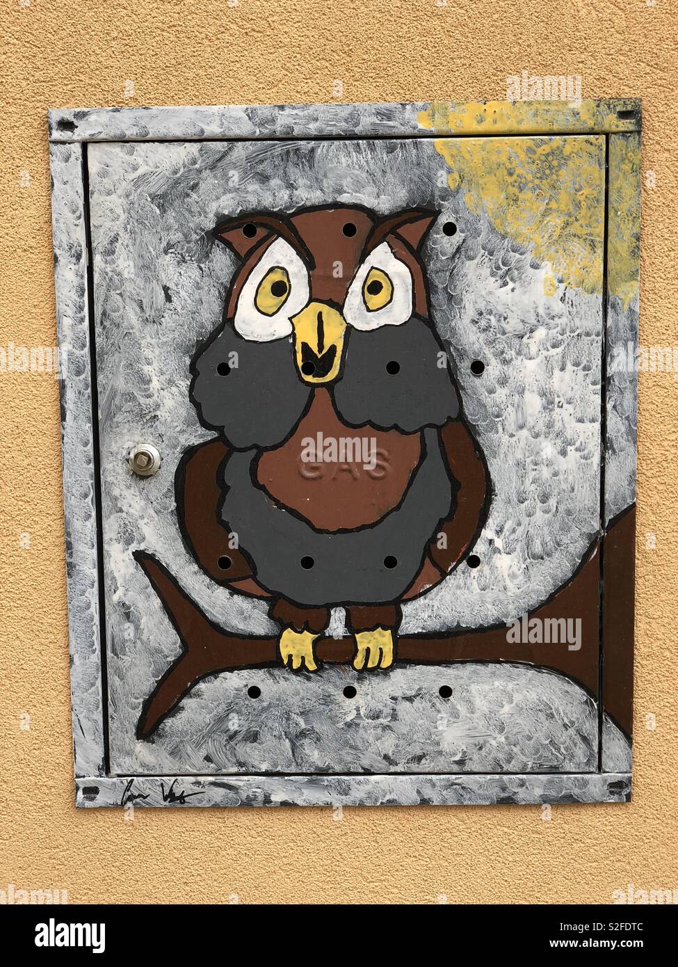 Owl design, creative graffiti over a metallic counter of the gas meter - Smartphone Captured Stock Image