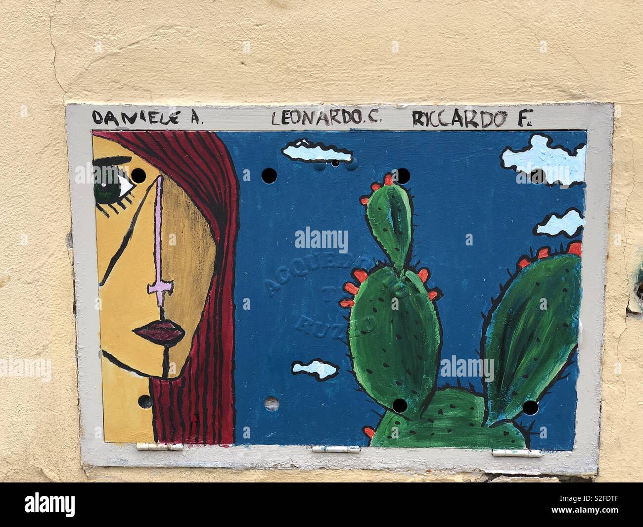 Abstract design, creative graffiti over a metallic counter of the gas meter - Smartphone Captured Stock Image