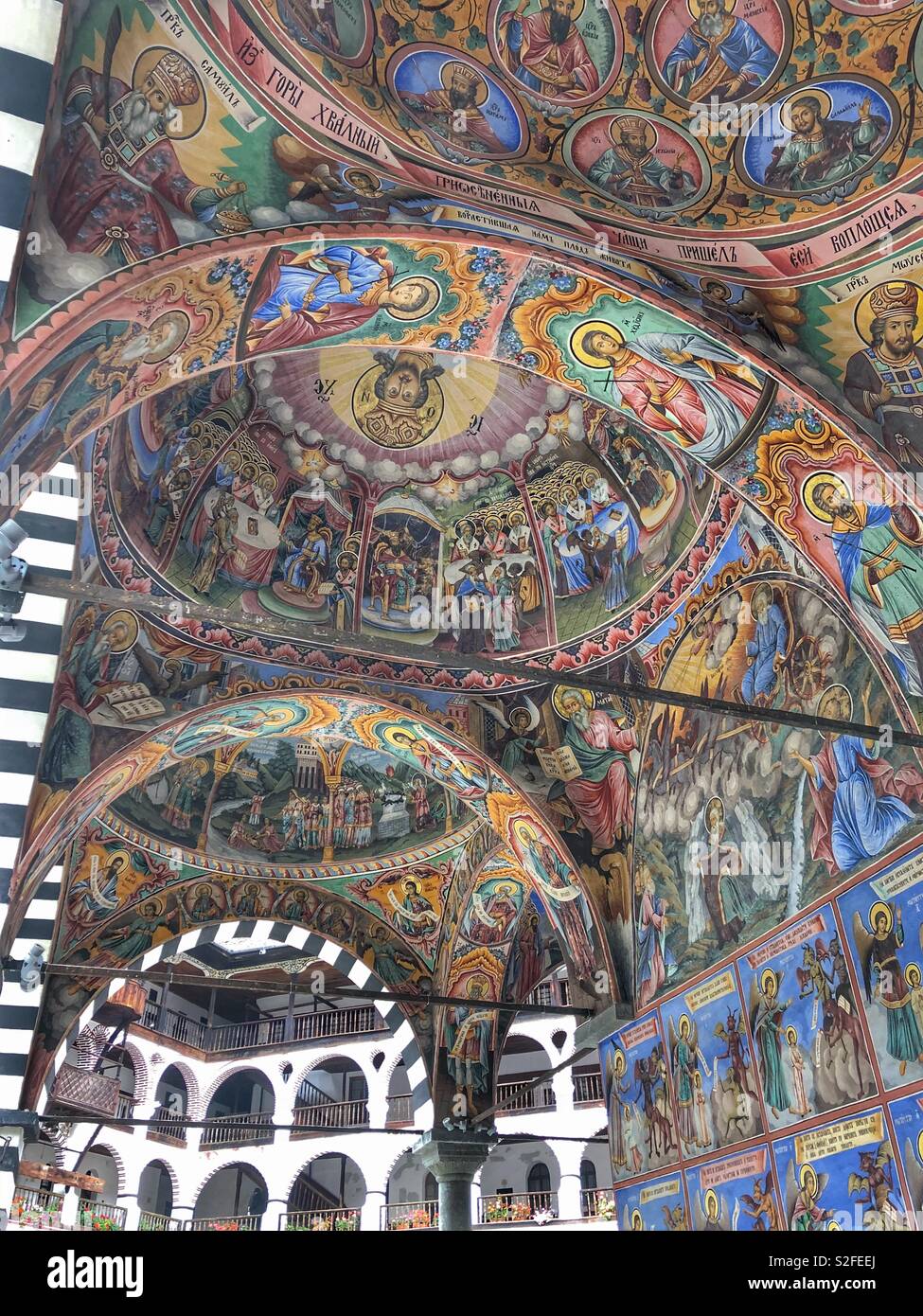 UNESCO World Heritage Site, Rila Monastery in Bulgaria. Painted frescoes on walls and ceilings. - Smartphone Captured Stock Image