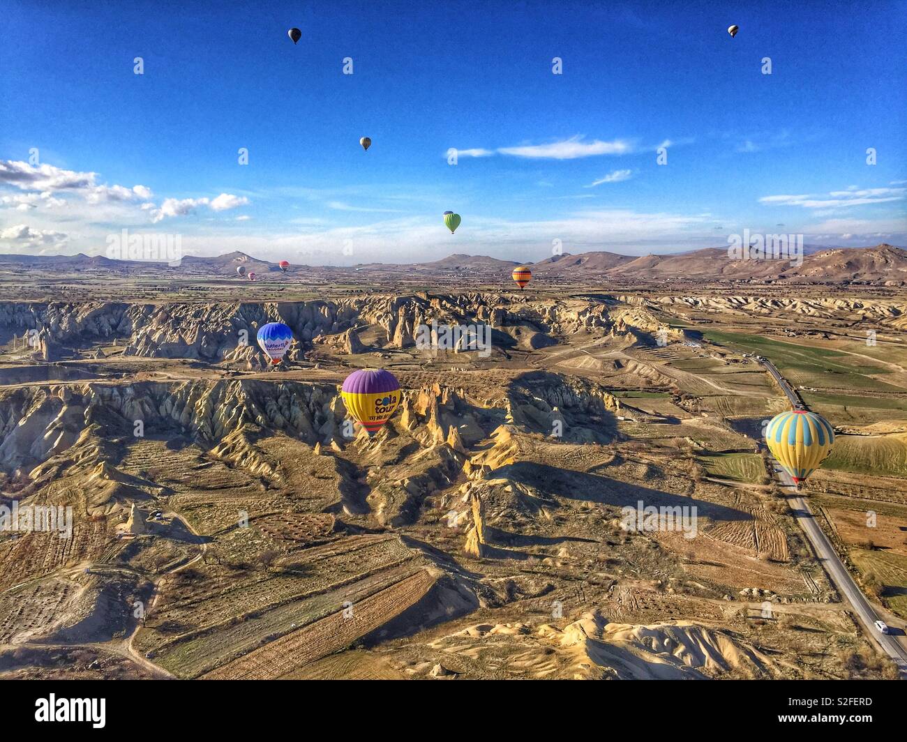 Hot Air Balloons in the air in Kapadokya, Turkey Stock Photo