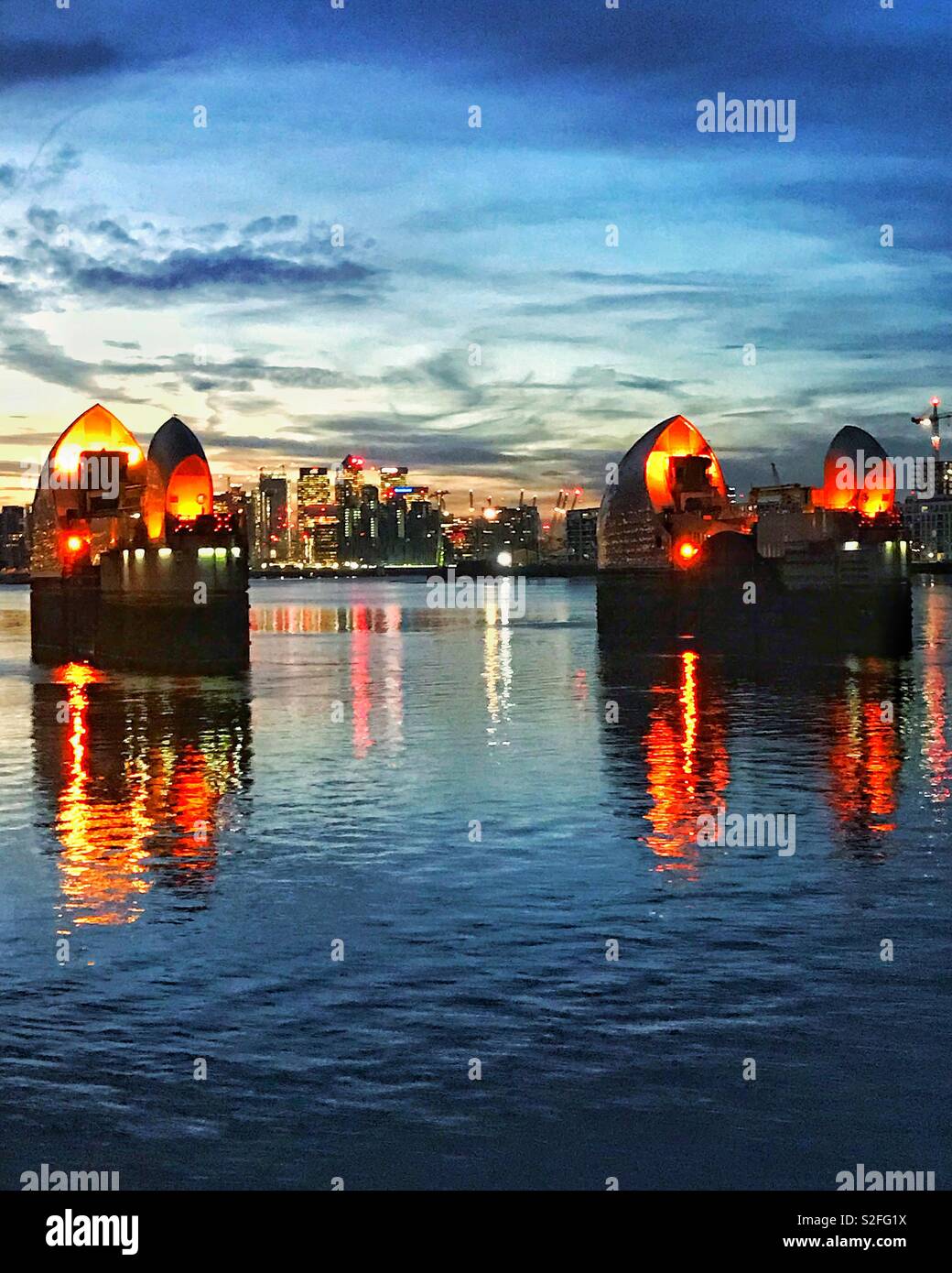 Thames Barrier and Canary Wharf in the background - Smartphone Captured Stock Image