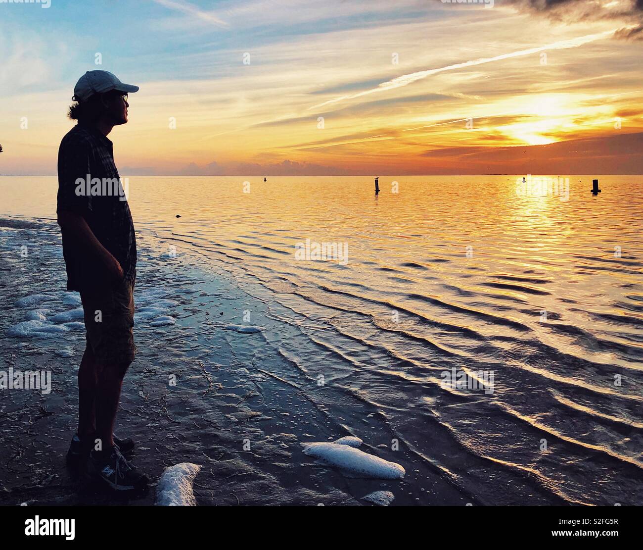 Sunset worshiper in Florida - Smartphone Captured Stock Image