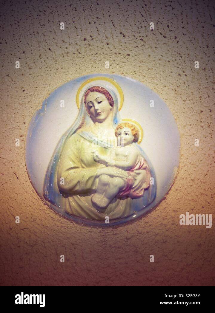 Madonna and baby Jesus - a wall plaque on the streets of Malta Stock Photo