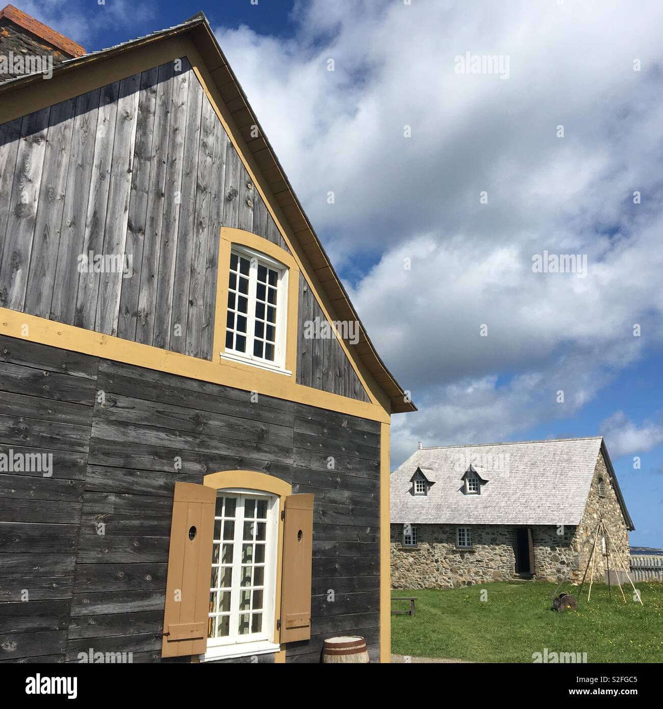 Louisbourg barns and house at fortress tourist attraction - Smartphone Captured Stock Image