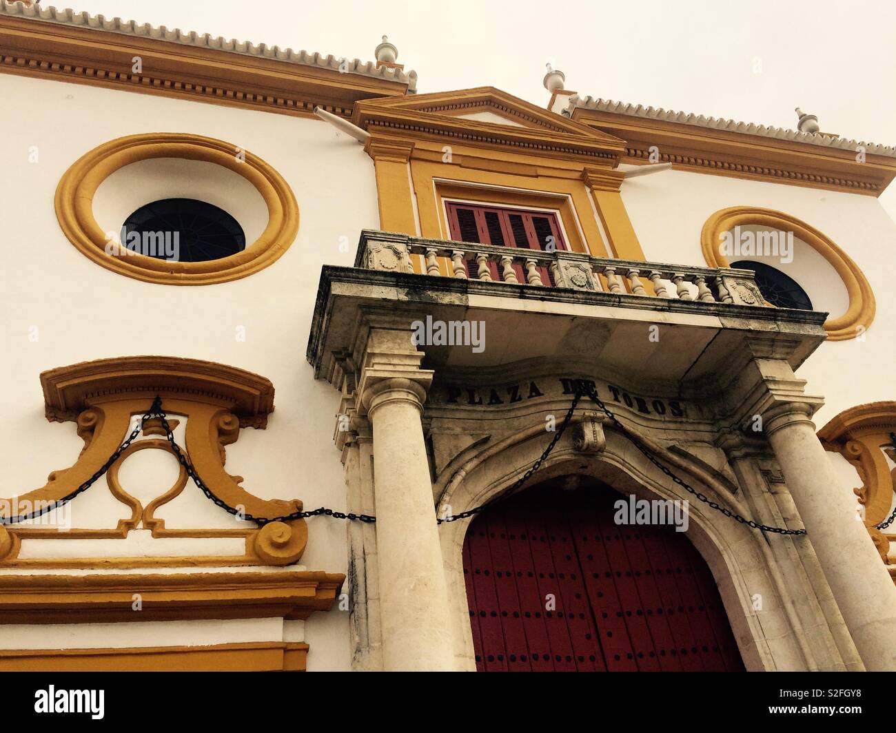 Front of Maestranza bullring with lots of ornate architectural details on this historical building in Seville Spain Stock Photo