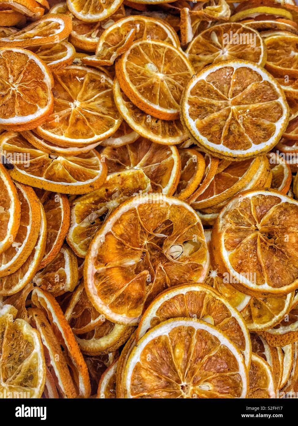 Dried sliced oranges background Stock Photo
