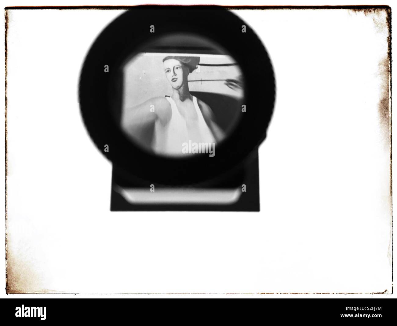 Soviet era political propaganda poster from the 1930’s viewed on a slide on a Lightbox - Smartphone Captured Stock Image