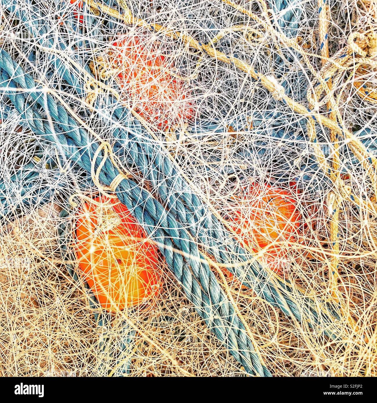 Fishing nets, ropes and floats in a boat - Smartphone Captured Stock Image