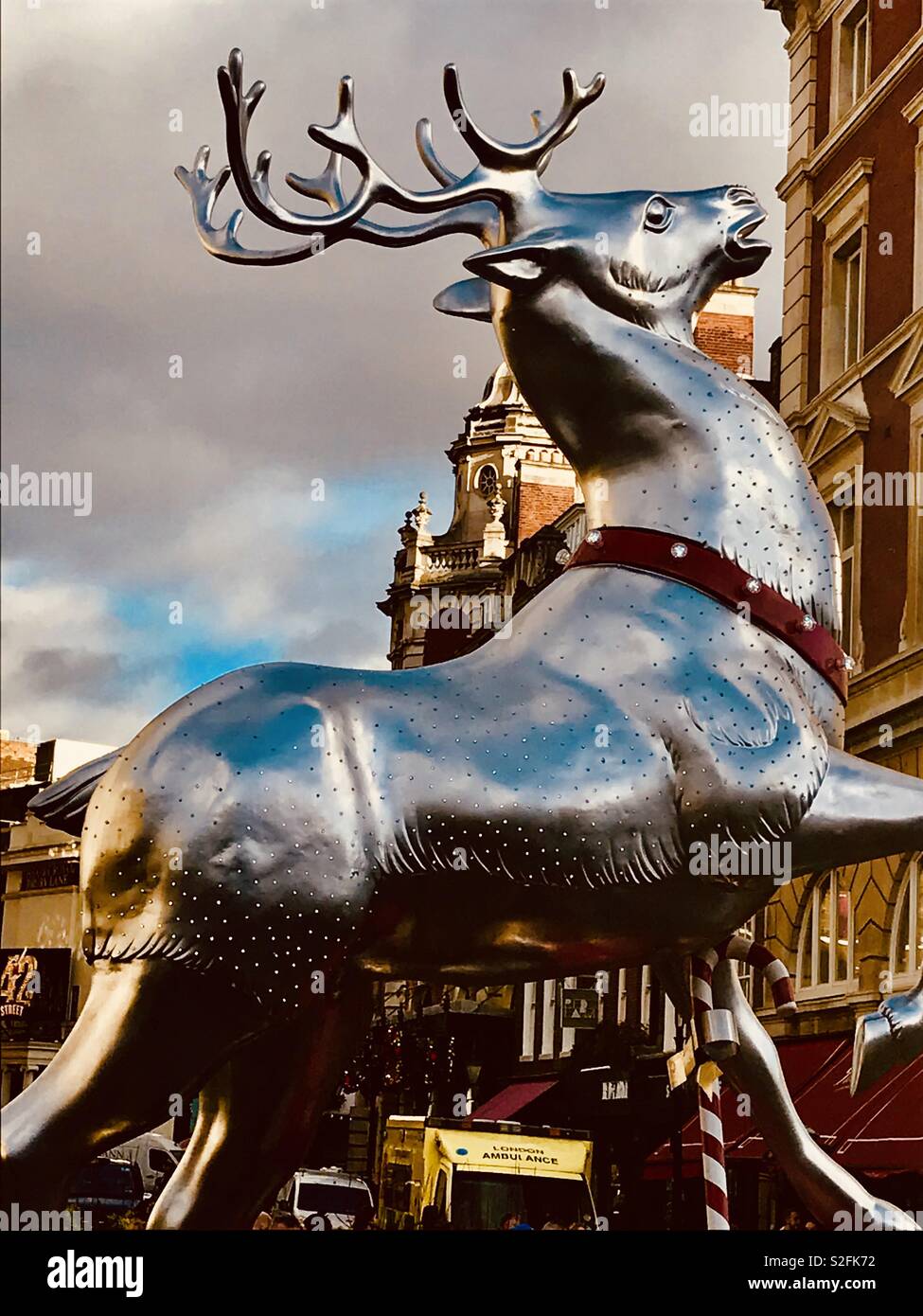 Christmas celebrations and decorations, Reindeer statue in Covent Garden, London, England, UK Stock Photo