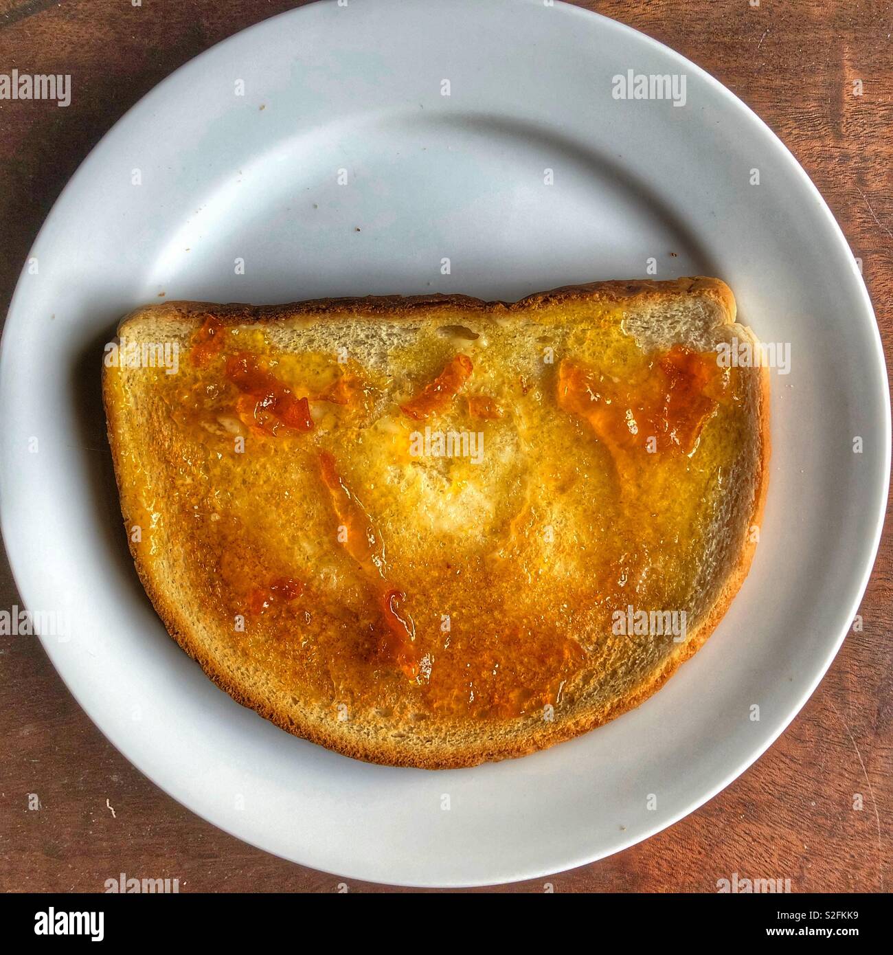 Toast with marmalade Stock Photo Alamy