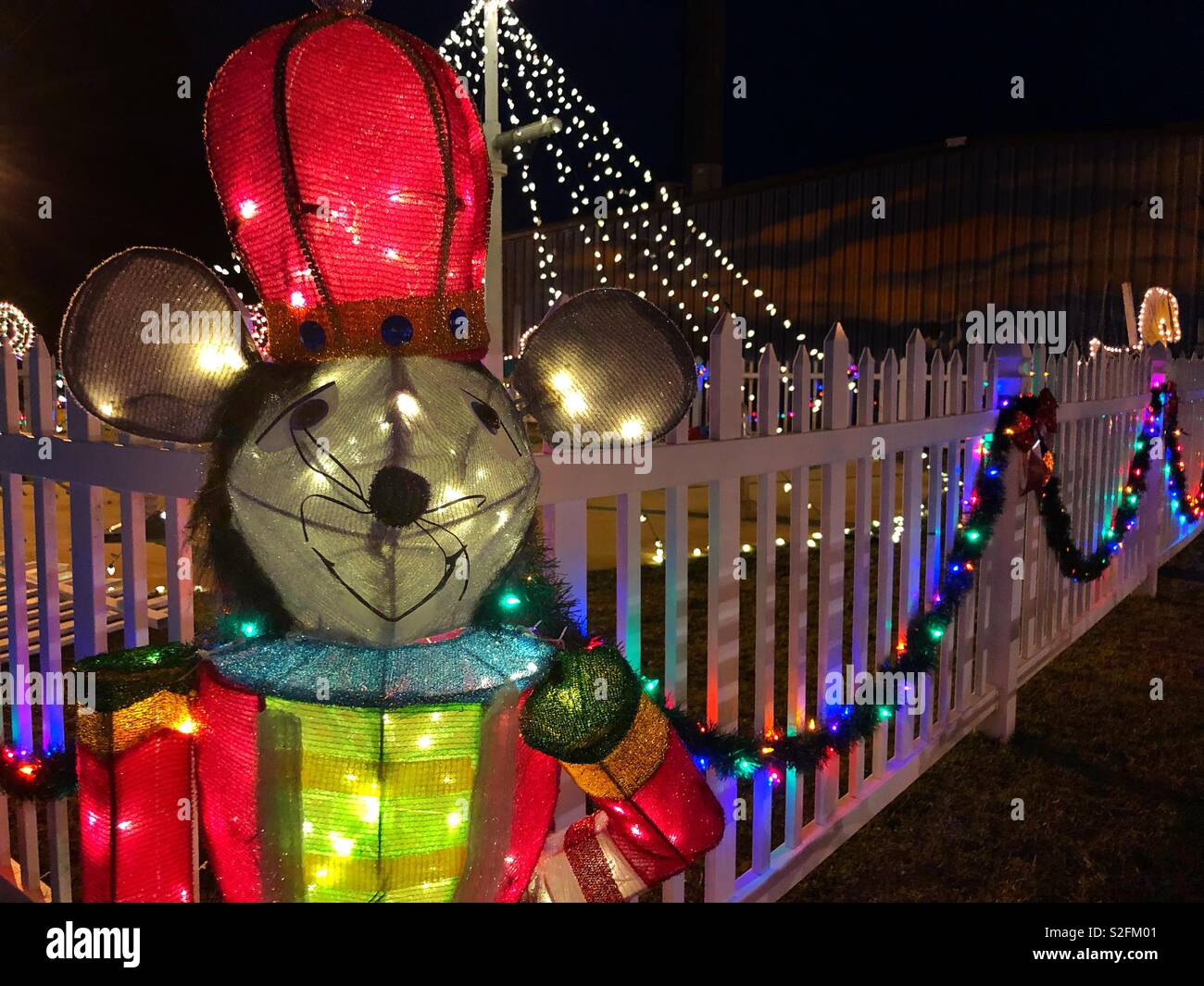 The Nutcracker Mouse King stands on a lawn at night, Dec. 23, 2018, in Bayou La Batre, Alabama. Stock Photo
