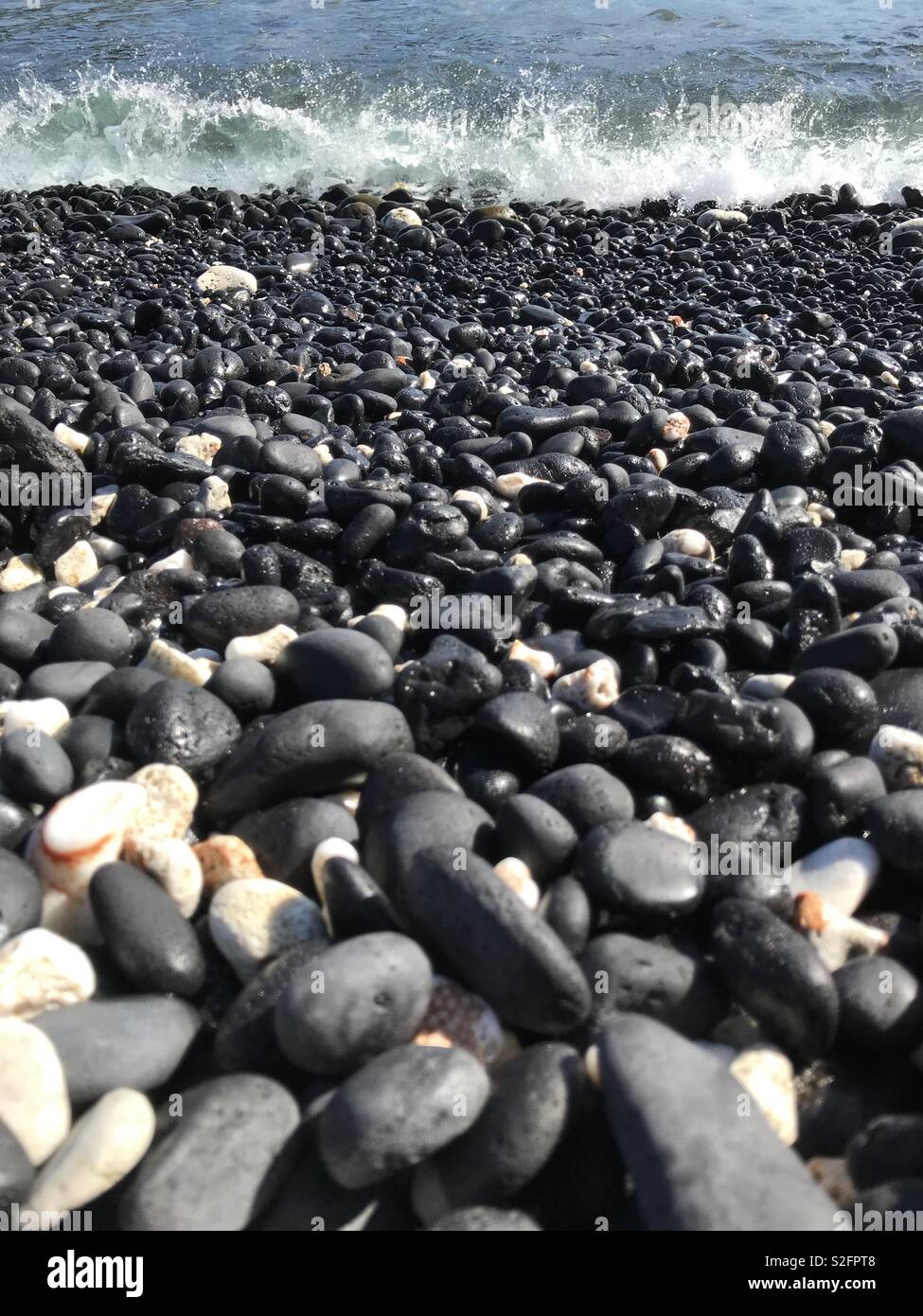 Beach with pebbles on Maui Stock Photo