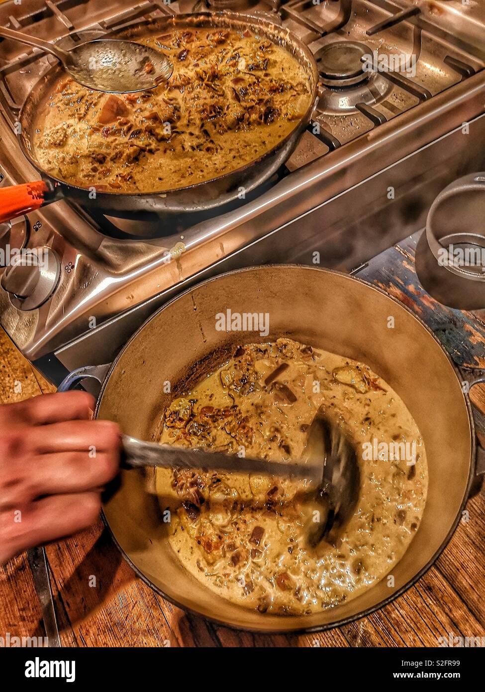 Preparing a homemade fish curry - Smartphone Captured Stock Image
