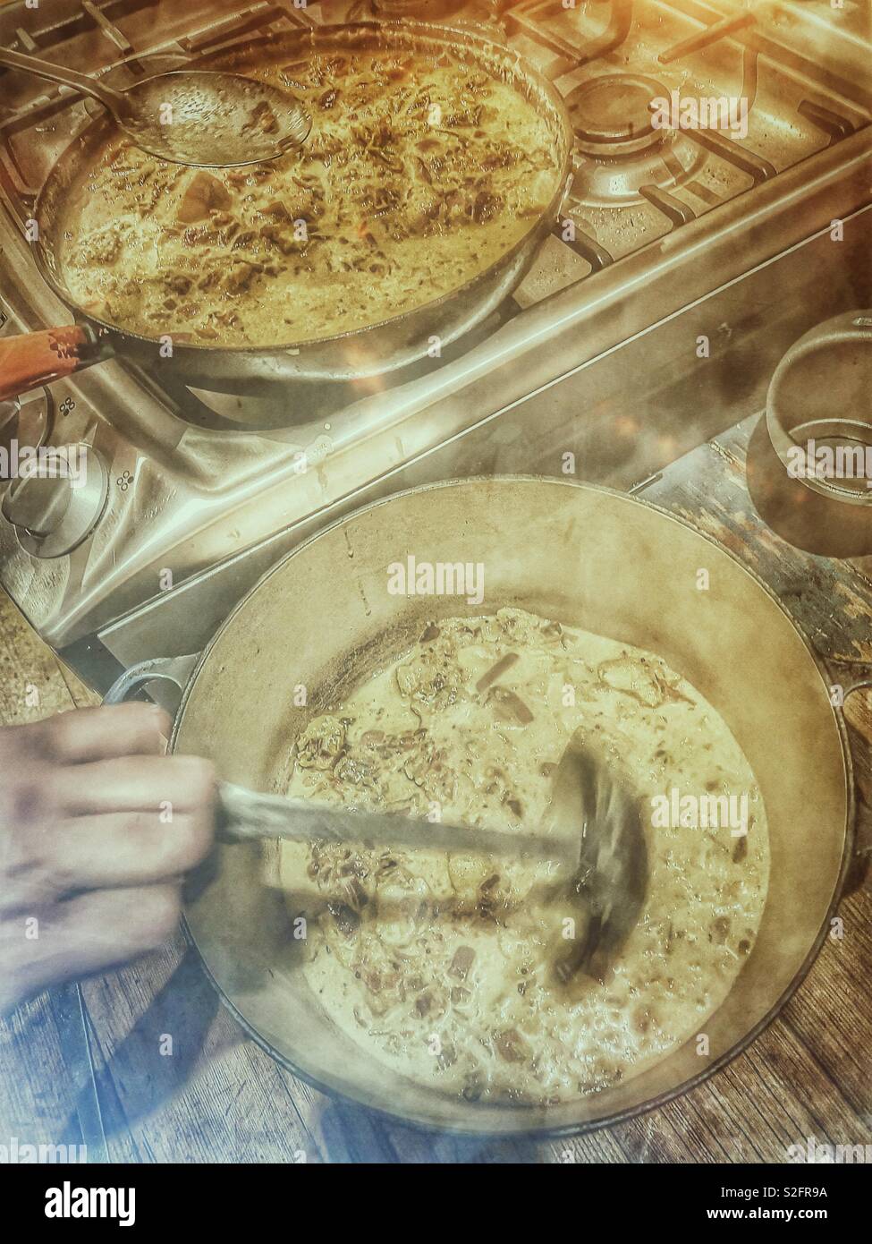 Cooking a homemade fish curry - Smartphone Captured Stock Image