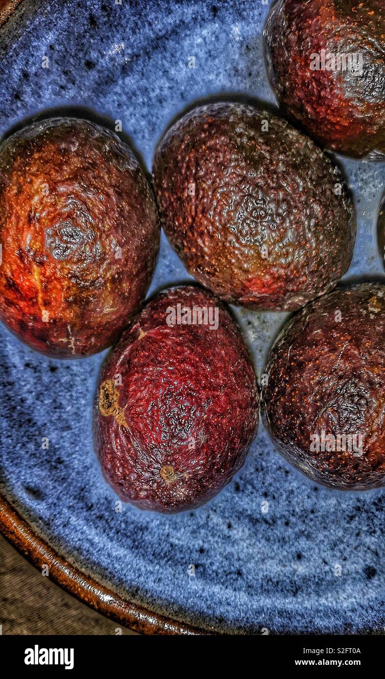 Bowl of ripe avocados Stock Photo