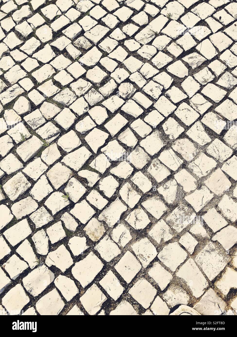 Stone paved path showing irregular shapes - Smartphone Captured Stock Image