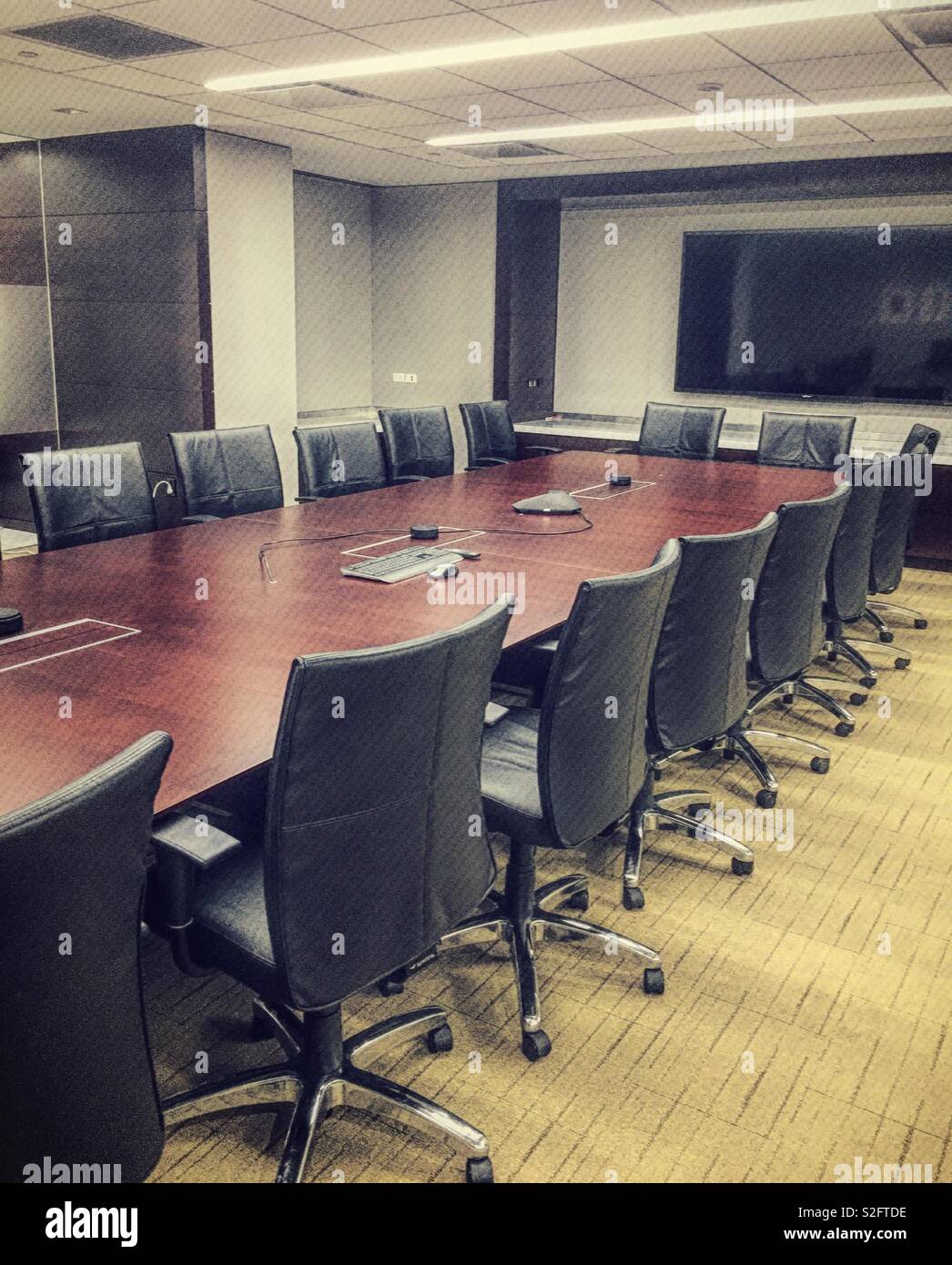 Conference room with a large table and extensive A/V support - Smartphone Captured Stock Image