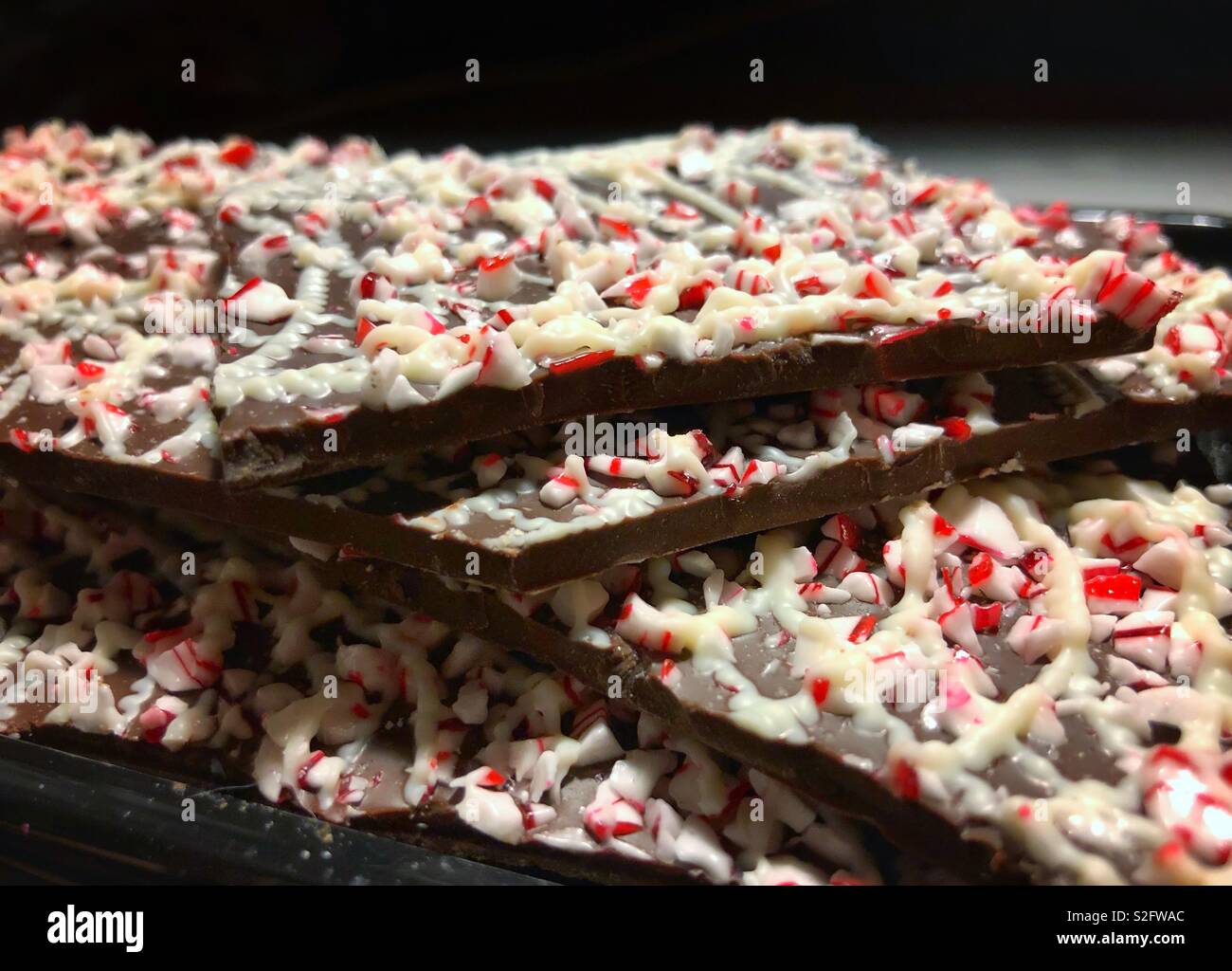 Milk chocolate peppermint bark candy Stock Photo Alamy