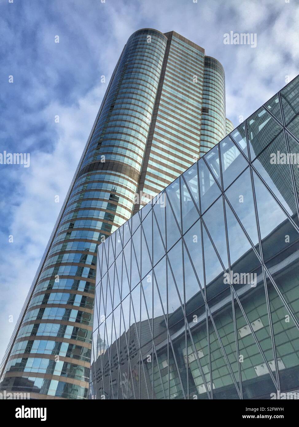Tower 2 and the Forum building, part of the Exchange Square commercial complex in Central, Hong Kong Island - Smartphone Captured Stock Image