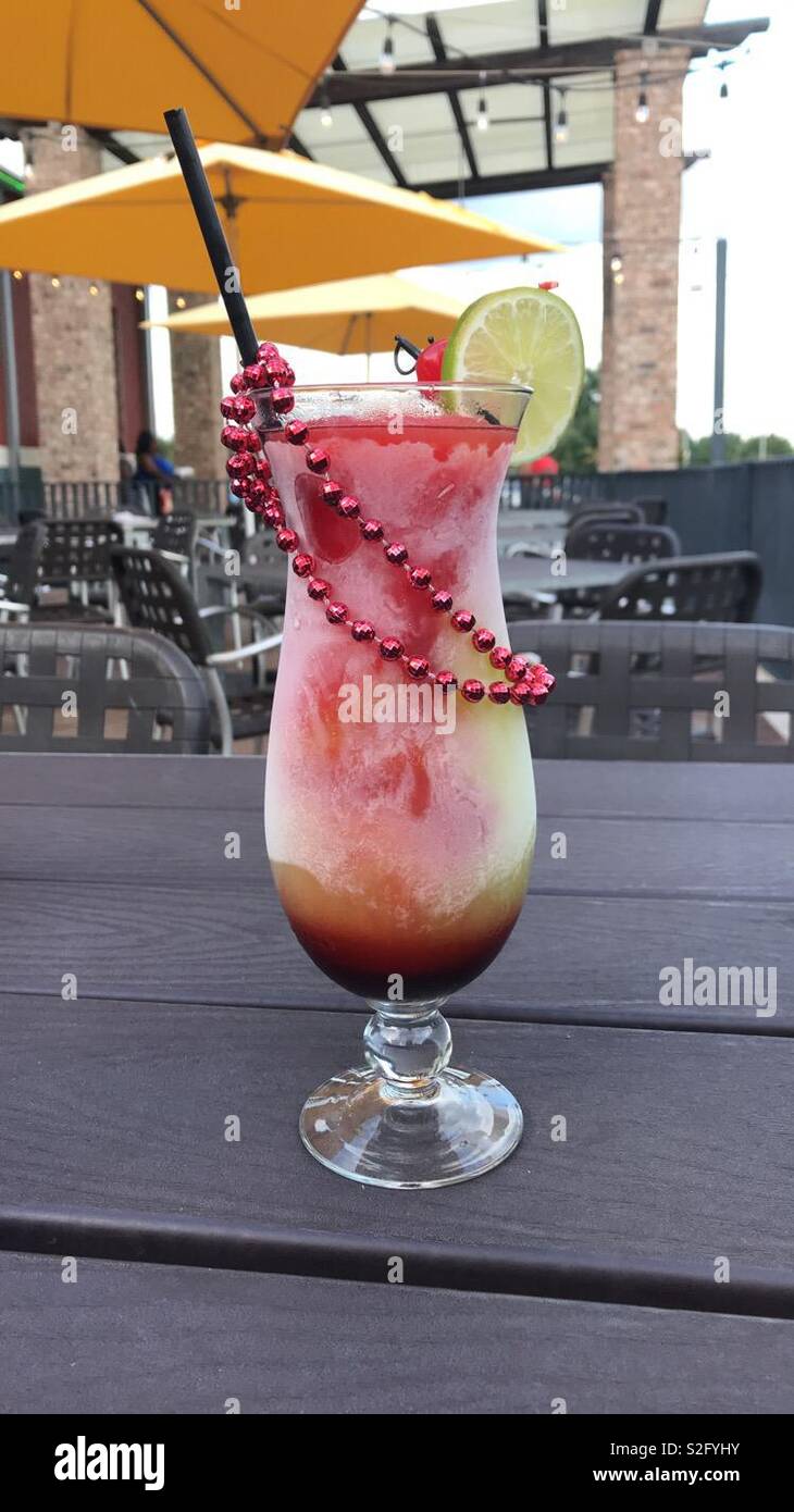 Frozen alcoholic beverage on a table outside a restaurant Stock Photo