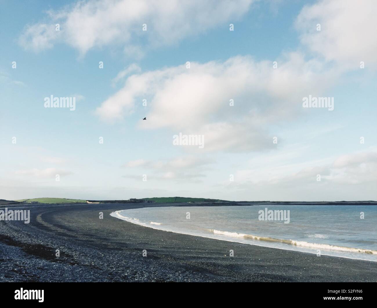 View of the sweep of Cemlyn Bay, Anglesey, North Wales - Smartphone Captured Stock Image