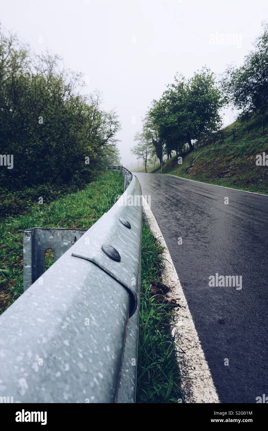 road and green trees in the mountain Stock Photo