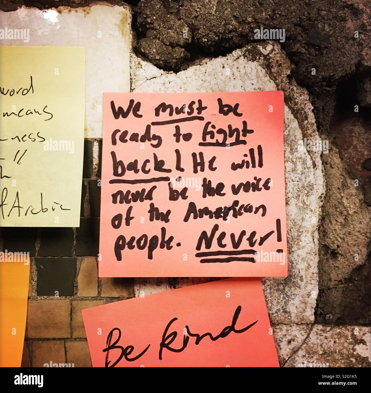 Subway Therapy post it note with Anti Trump message - Smartphone Captured Stock Image