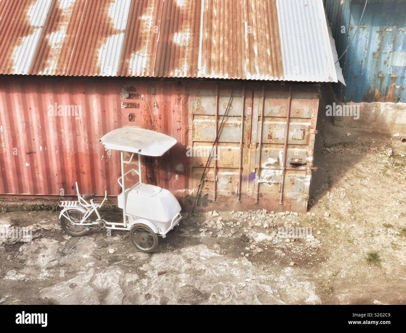 Lonely planet l: ice cream rickshaw awaiting repair - Smartphone Captured Stock Image