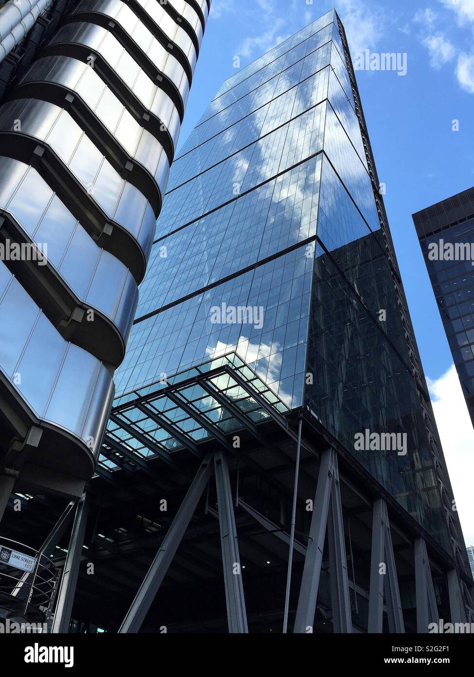 Blue sky reflections on city skyscrapers. Stock Photo