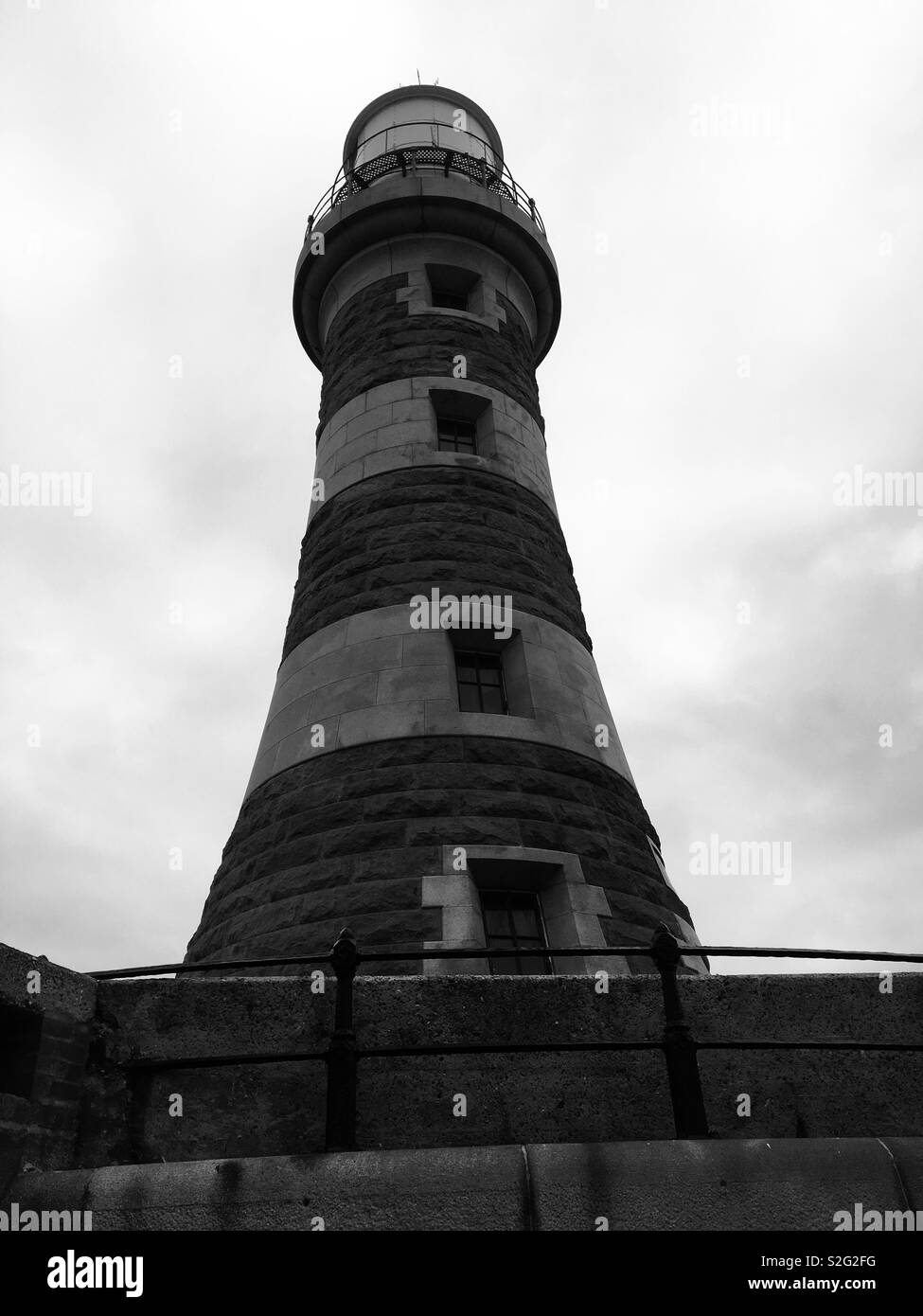 A light house on the pier at roker beach Stock Photo