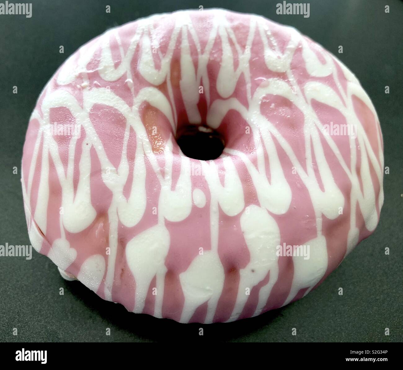 Pink and white iced doughnut - Smartphone Captured Stock Image
