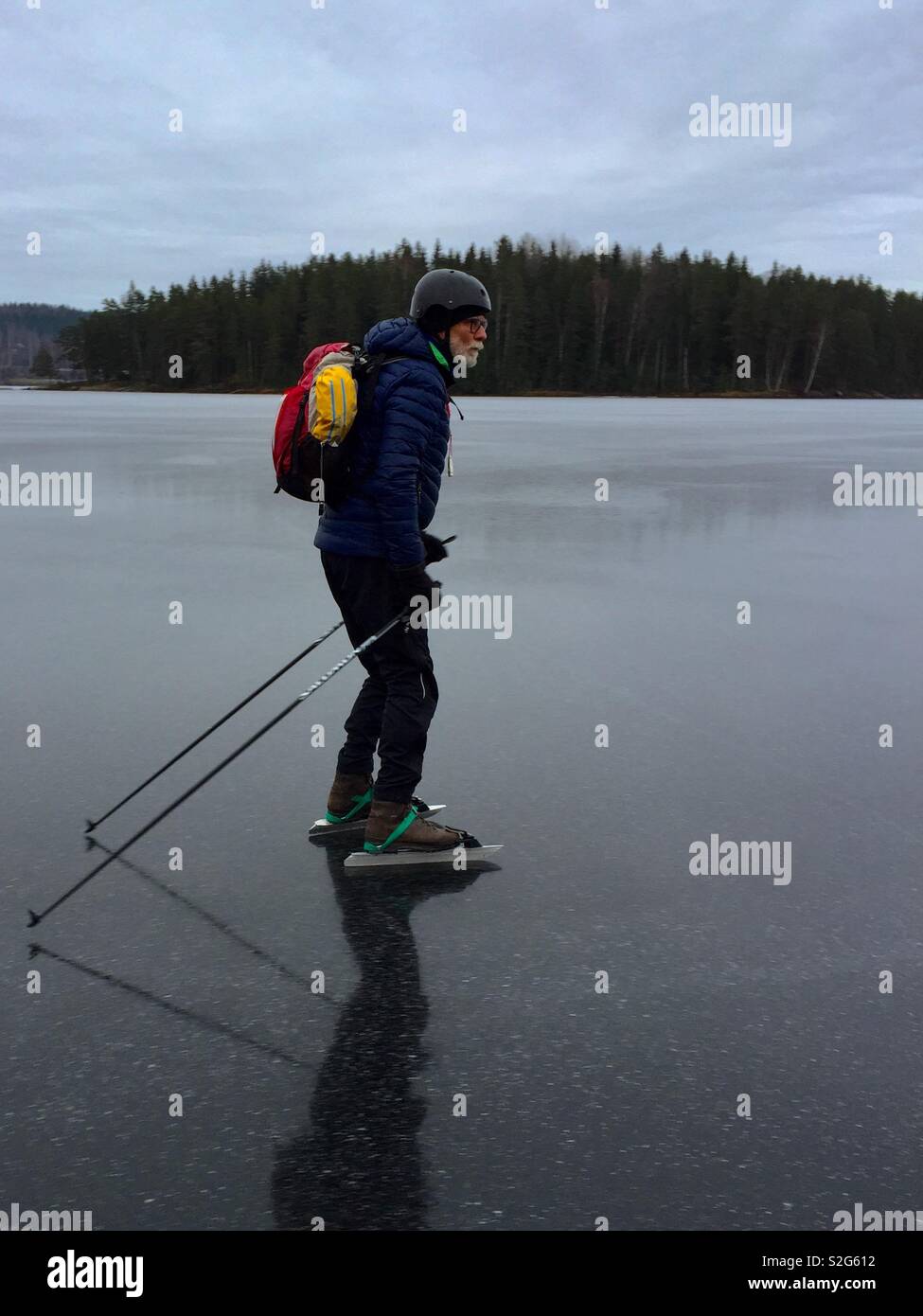 Ice skating on frozen lake. - Smartphone Captured Stock Image