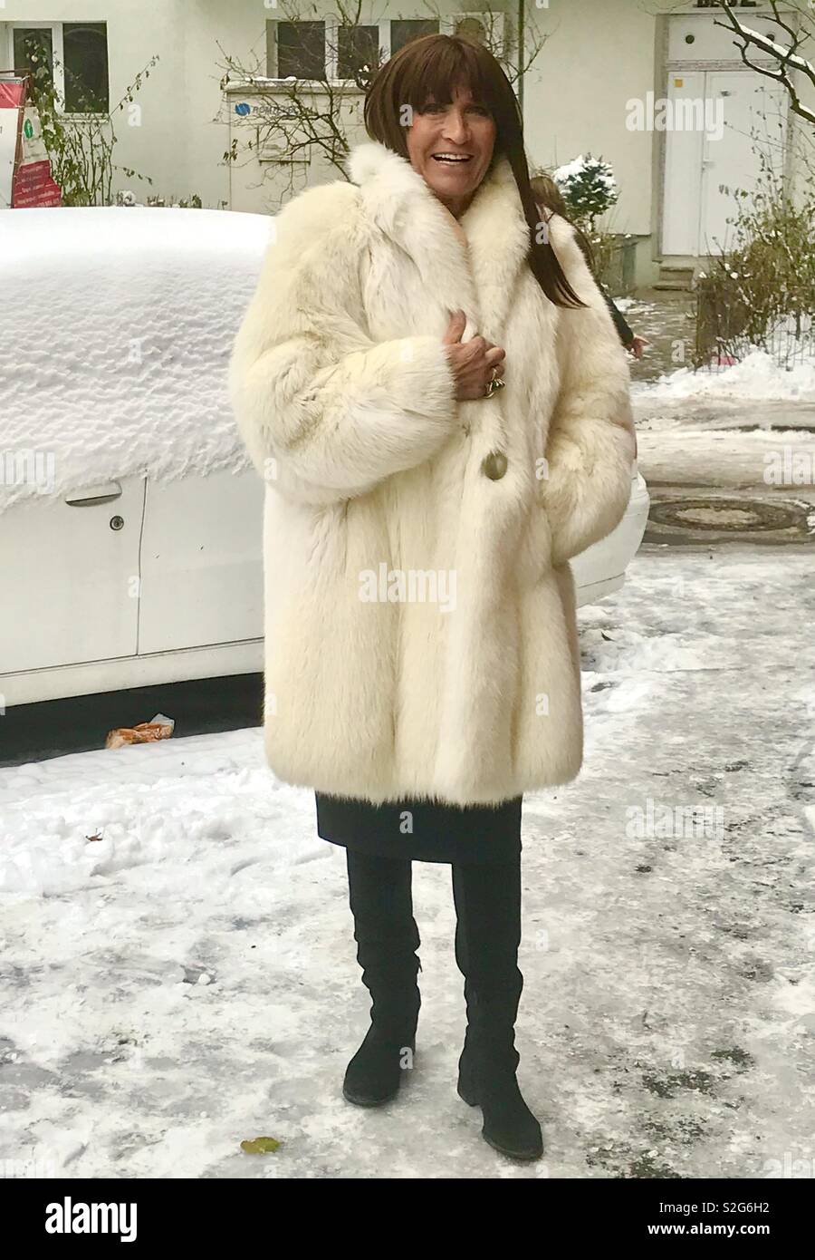 A woman wears a coat made from the fur of a Polar Bear Stock Photo - Alamy